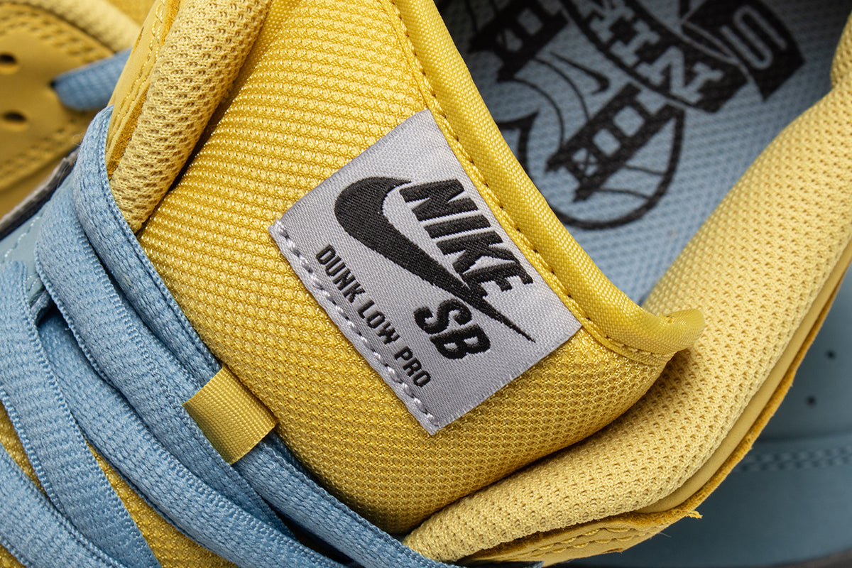 Nike SB - Dunk Low Pro
Style # IR1888-700
Color : Lightning / Wolf Grey / Denim Turquoise