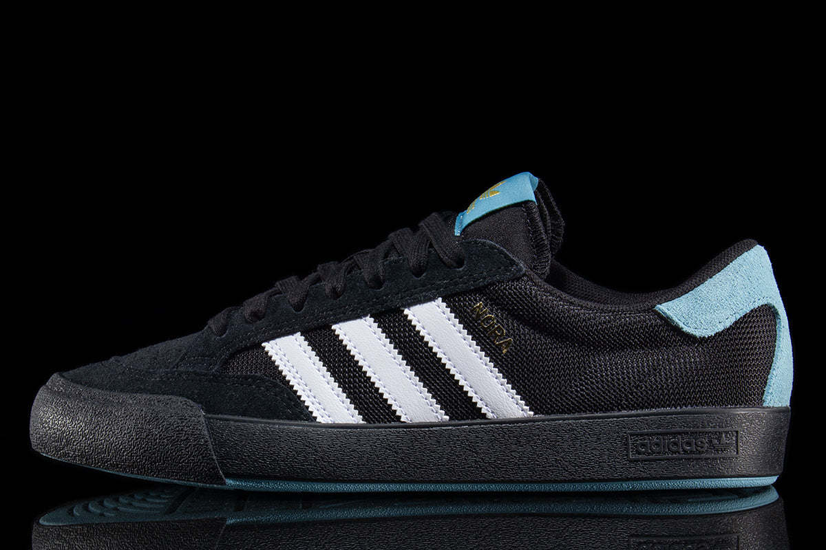 Adidas - Nora
Style # JP8588
Color : Core Black / White