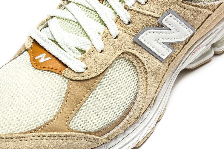 New Balance | 2002R Style # M2002RSC Color : Sandstone / Incense / Agora