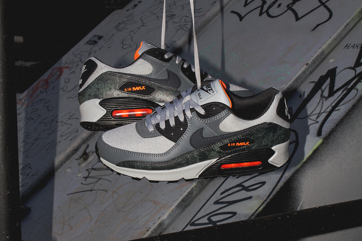 Nike - Air Max 90 Premium
Style # IQ0172-900
Color : Multi Color / Black / Smoke Grey