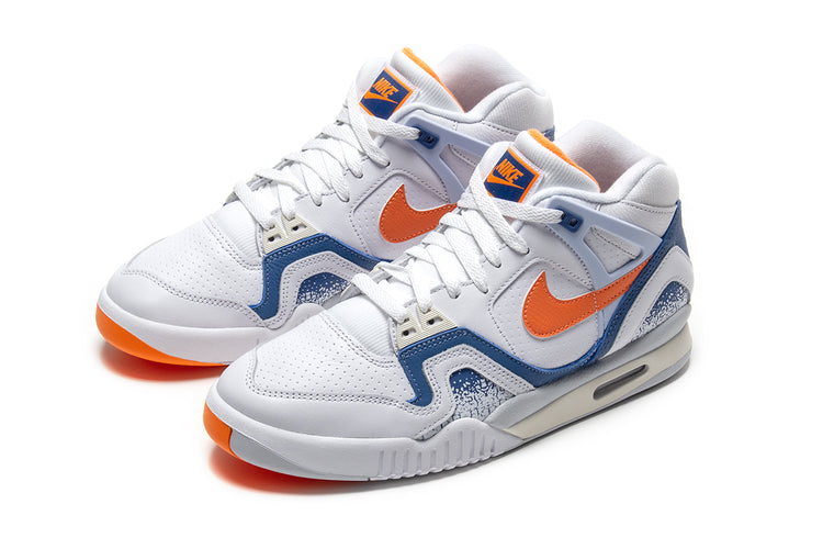 Nike - Air Tech Challenge II
Style # FZ9033-101
Color : White / Tart / Stone Blue / Football Grey