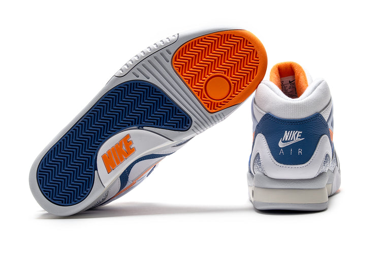 Nike - Air Tech Challenge II
Style # FZ9033-101
Color : White / Tart / Stone Blue / Football Grey