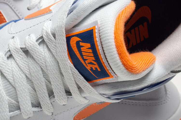 Nike - Air Tech Challenge II
Style # FZ9033-101
Color : White / Tart / Stone Blue / Football Grey