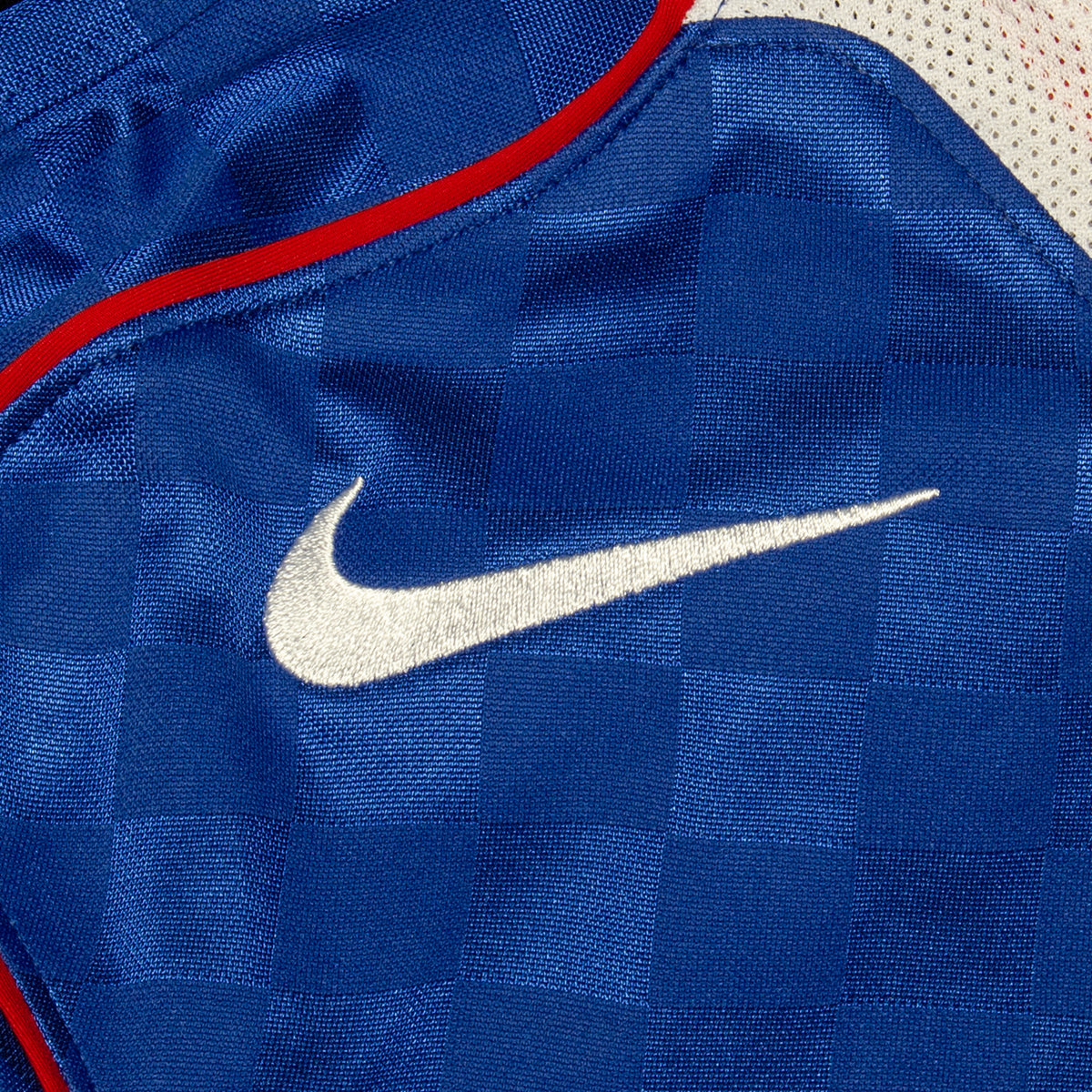 Nike - T90 Jersey
Style # IB4212-480
Color : Game Royal / White / Sport Red