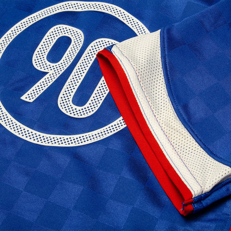 Nike - T90 Jersey
Style # IB4212-480
Color : Game Royal / White / Sport Red