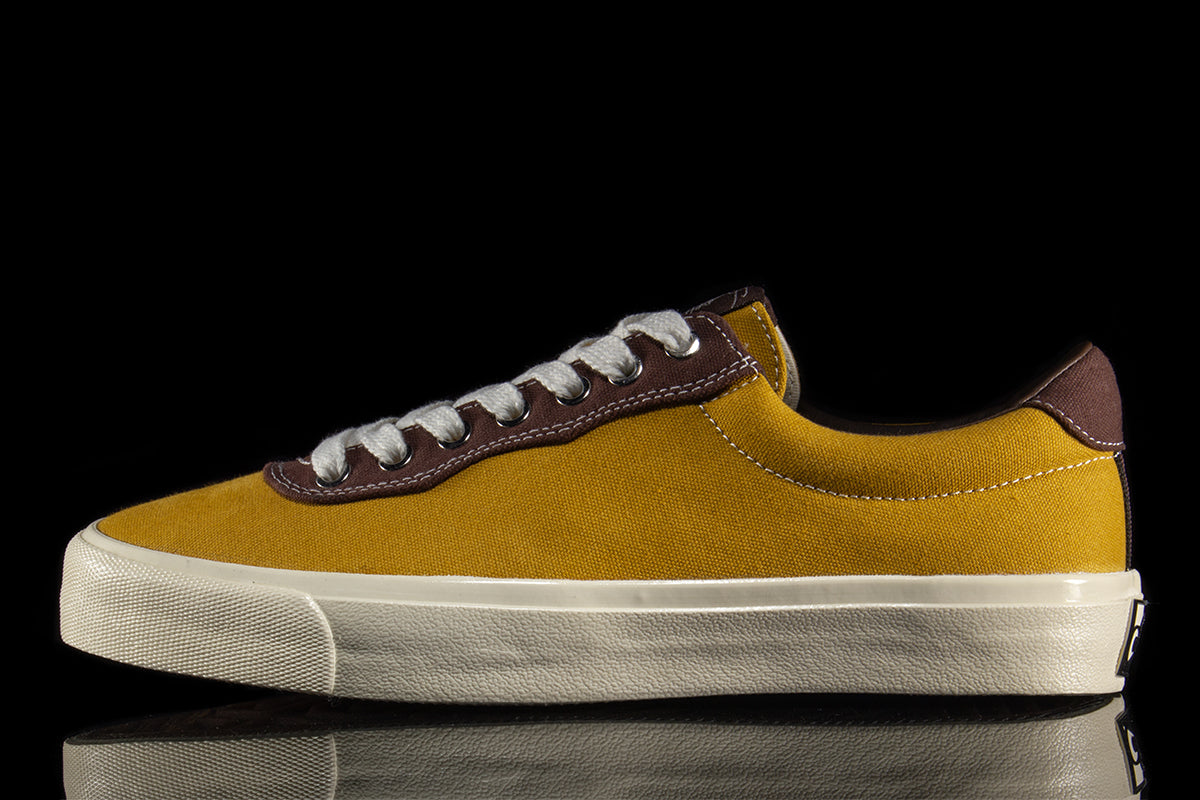 Last Resort AB | VM001 Canvas Lo x Julian Smith Color : Yellow / Brown