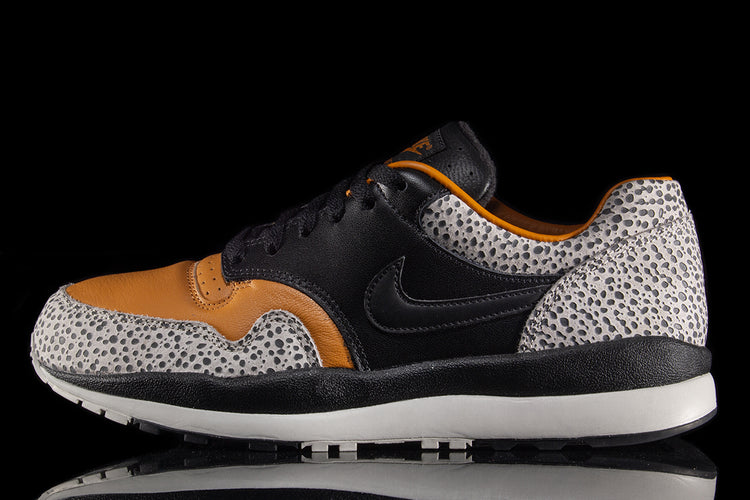 Nike | Air Safari Style # HM3818-001 Color : Black / Monarch / LT Iron Ore