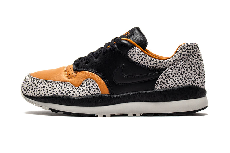 Nike | Air Safari Style # HM3818-001 Color : Black / Monarch / LT Iron Ore