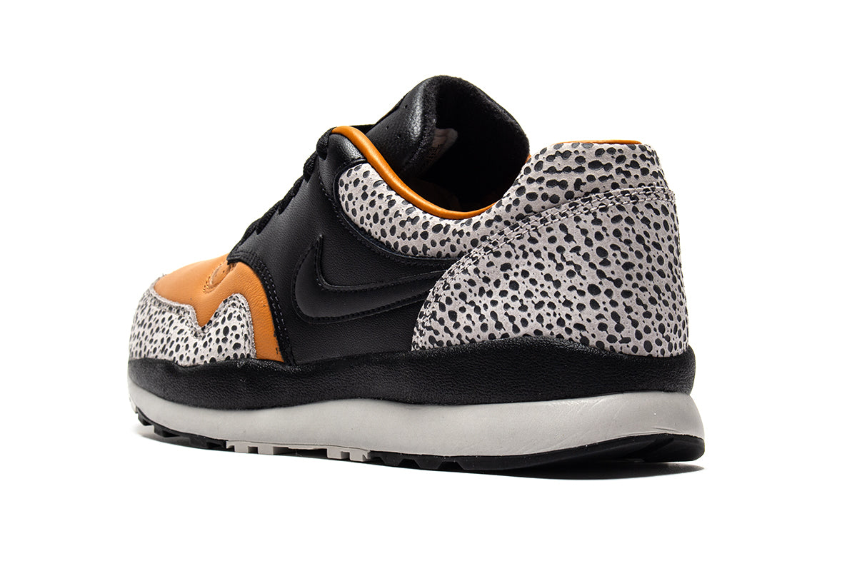 Nike | Air Safari Style # HM3818-001 Color : Black / Monarch / LT Iron Ore