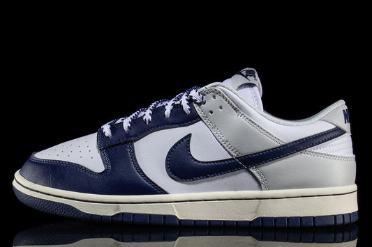 Nike - Dunk Low Retro
Style # IM2222-101
Color : White / Midnight Navy / Photon Dust