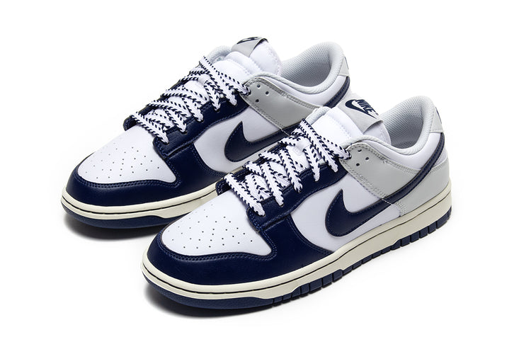 Nike - Dunk Low Retro
Style # IM2222-101
Color : White / Midnight Navy / Photon Dust