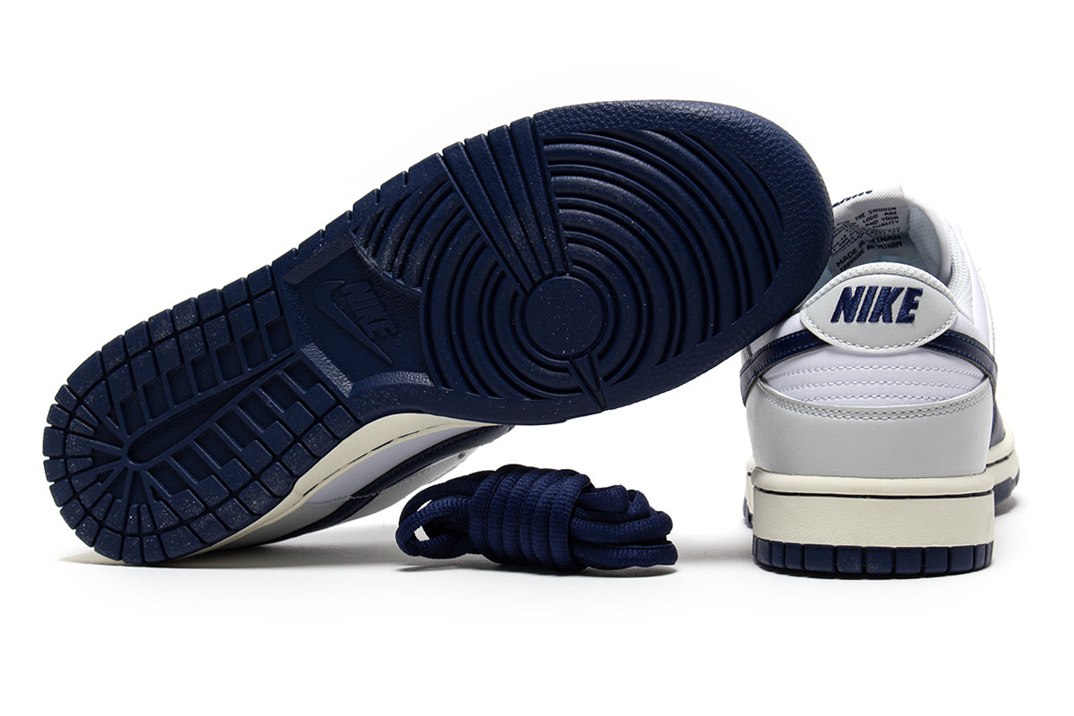 Nike - Dunk Low Retro
Style # IM2222-101
Color : White / Midnight Navy / Photon Dust