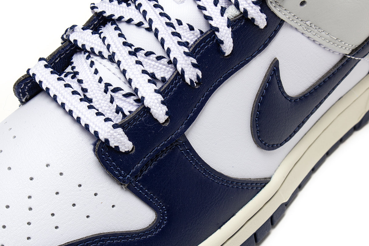 Nike - Dunk Low Retro
Style # IM2222-101
Color : White / Midnight Navy / Photon Dust