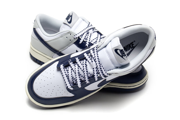 Nike - Dunk Low Retro
Style # IM2222-101
Color : White / Midnight Navy / Photon Dust