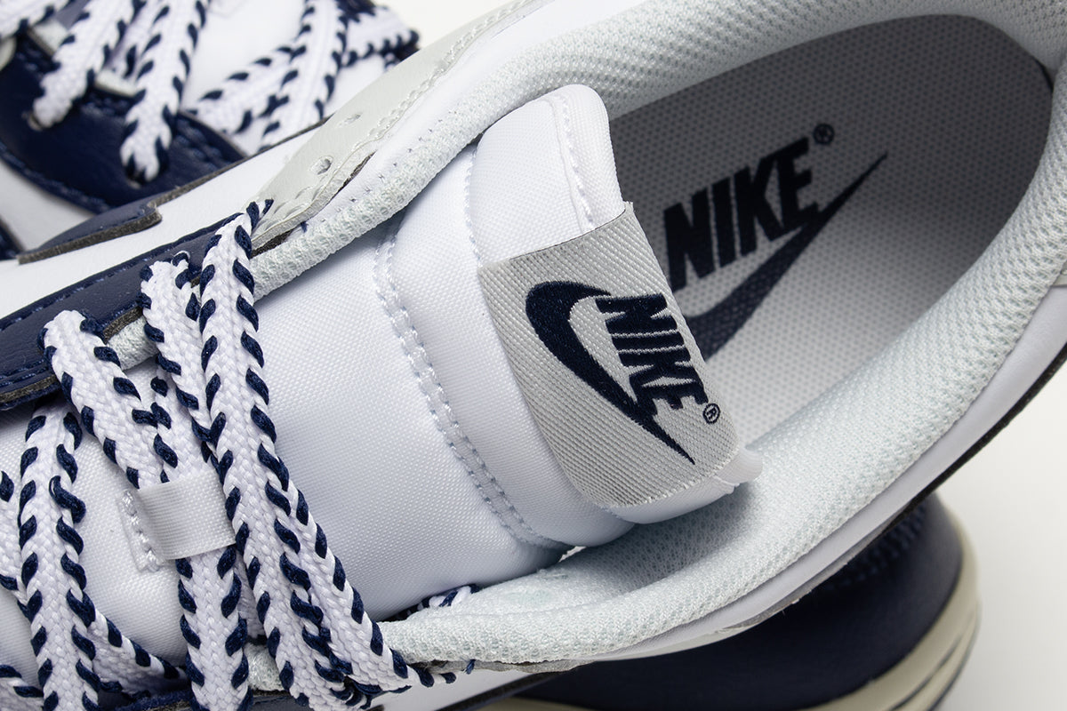 Nike - Dunk Low Retro
Style # IM2222-101
Color : White / Midnight Navy / Photon Dust