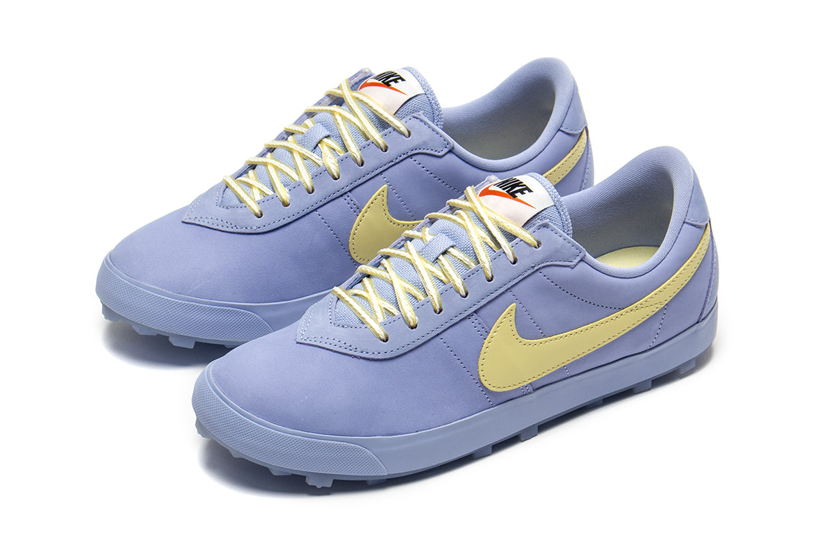 Nike - Astrograbber
Style # IH2341-400
Color : Aluminum / Soft Yellow / Sail / Black