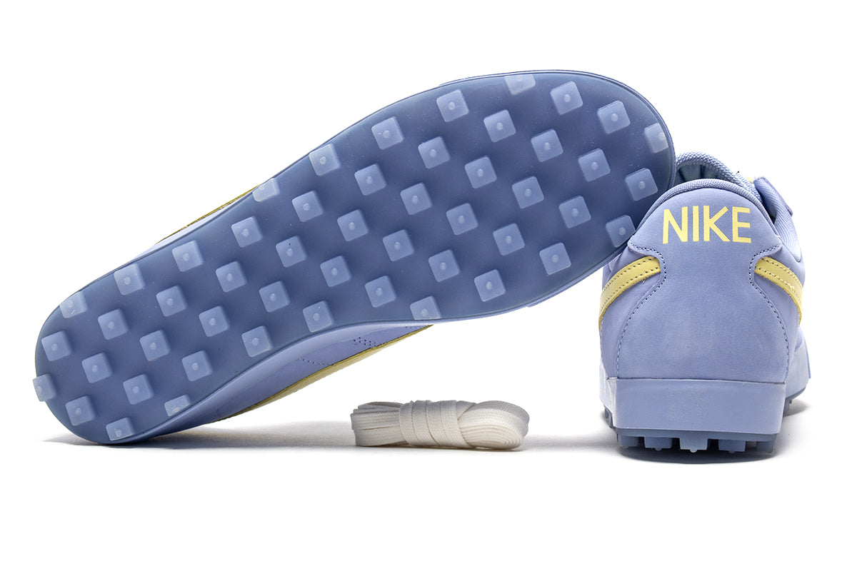 Nike - Astrograbber
Style # IH2341-400
Color : Aluminum / Soft Yellow / Sail / Black