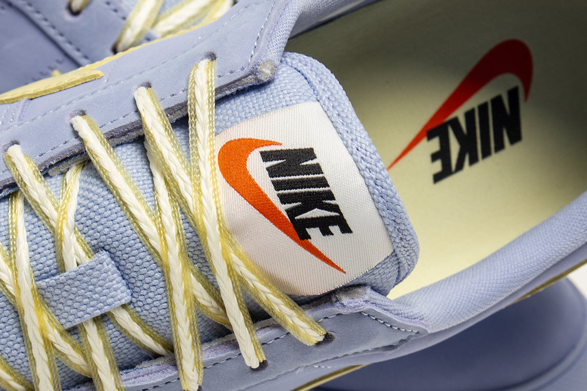 Nike - Astrograbber
Style # IH2341-400
Color : Aluminum / Soft Yellow / Sail / Black