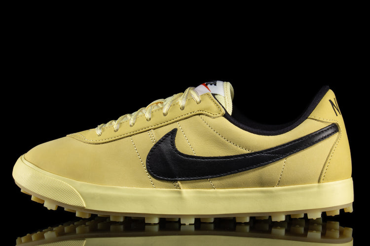 Nike - Astrograbber
Style # IH2341-700
Color : Soft Yellow / Black / Sail / Safety Orange