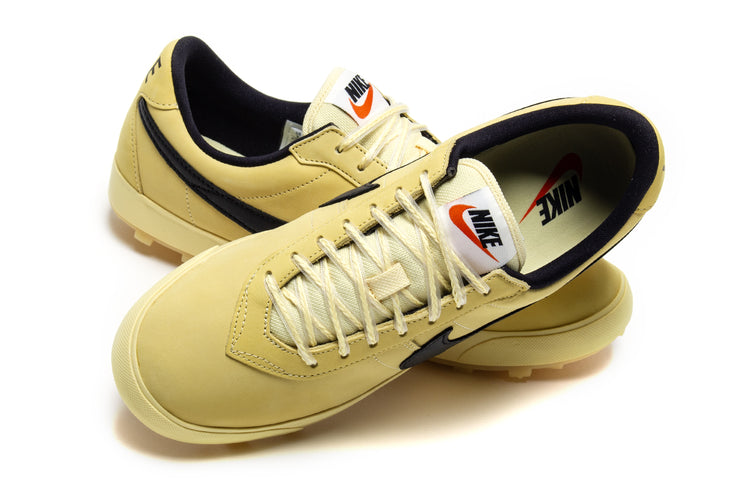Nike - Astrograbber
Style # IH2341-700
Color : Soft Yellow / Black / Sail / Safety Orange