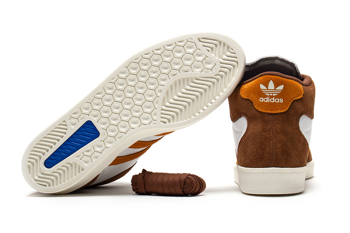 Adidas - Superskate
Style # JP8608
Color : Brown / Rustic Orange / Crystal White