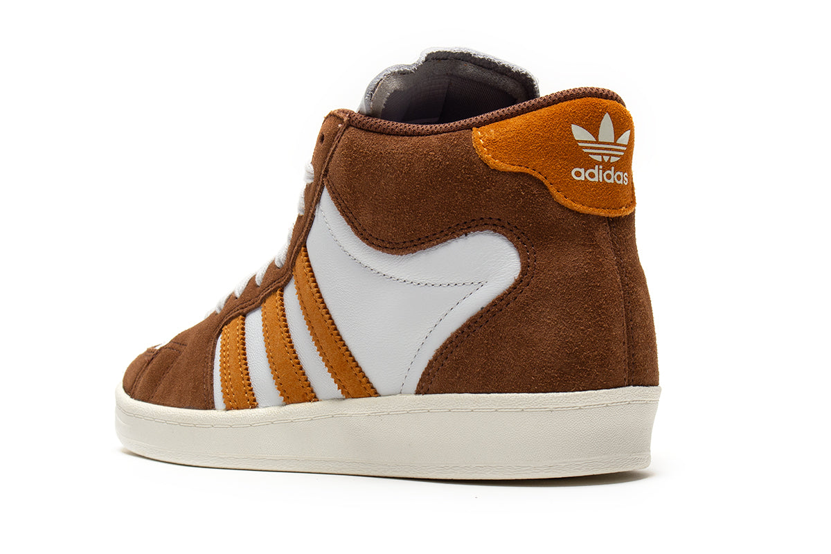 Adidas - Superskate
Style # JP8608
Color : Brown / Rustic Orange / Crystal White