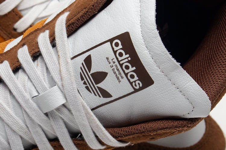 Adidas - Superskate
Style # JP8608
Color : Brown / Rustic Orange / Crystal White