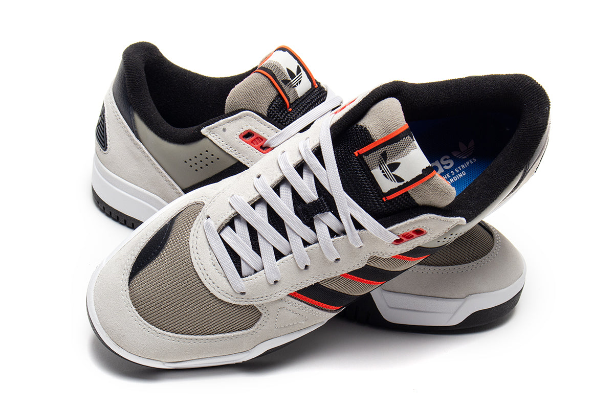 Adidas - Tekkira Cup
Style # JQ8906
Color : Orb Grey / Core Black / Solar Red