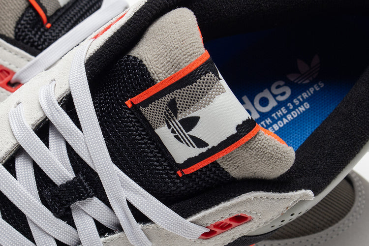 Adidas - Tekkira Cup
Style # JQ8906
Color : Orb Grey / Core Black / Solar Red