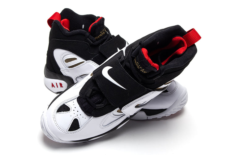 Nike - Air Diamond Turf II
Style # II7080-001
Color : Black / White / Fire Red / Metallic Gold