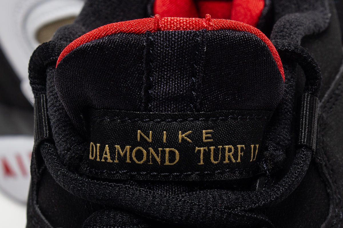 Nike - Air Diamond Turf II
Style # II7080-001
Color : Black / White / Fire Red / Metallic Gold
