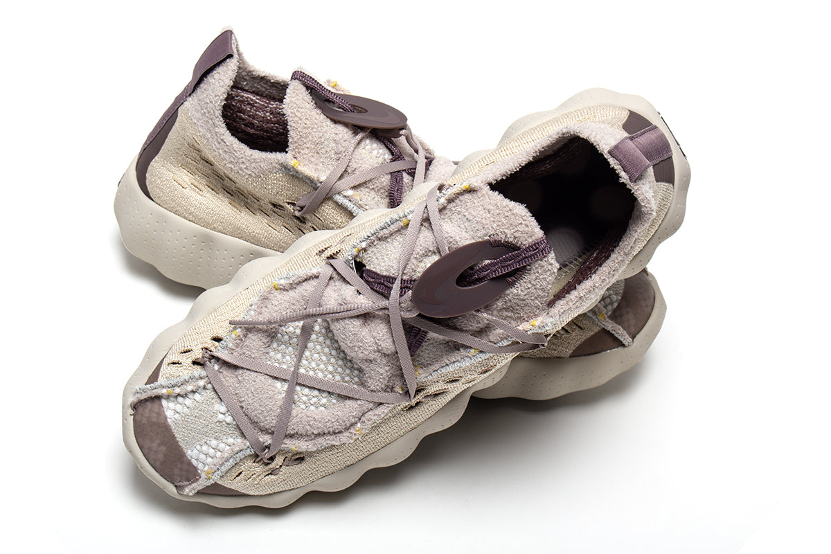 Nike - Mind 002 Flyknit
Style # IR2176-101
Color : Sanddrift / Fossil Rose / Plum Eclipse