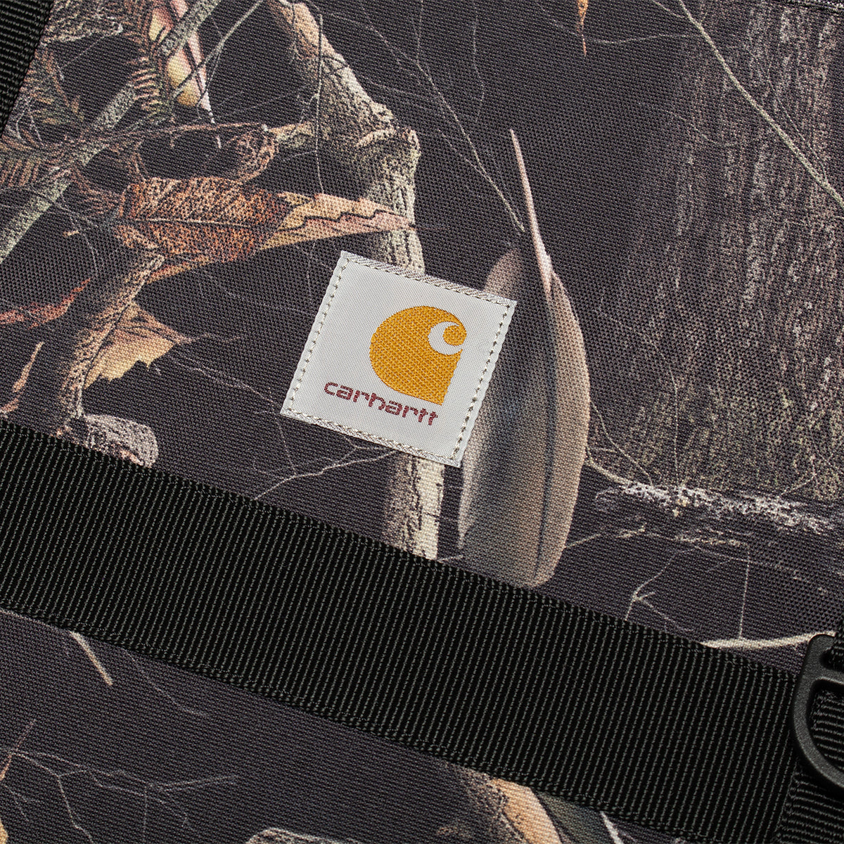 Carhartt WIP - Jake Messenger Bag
Style # I035347-3X5
Color : Camo Feather Tree / Black