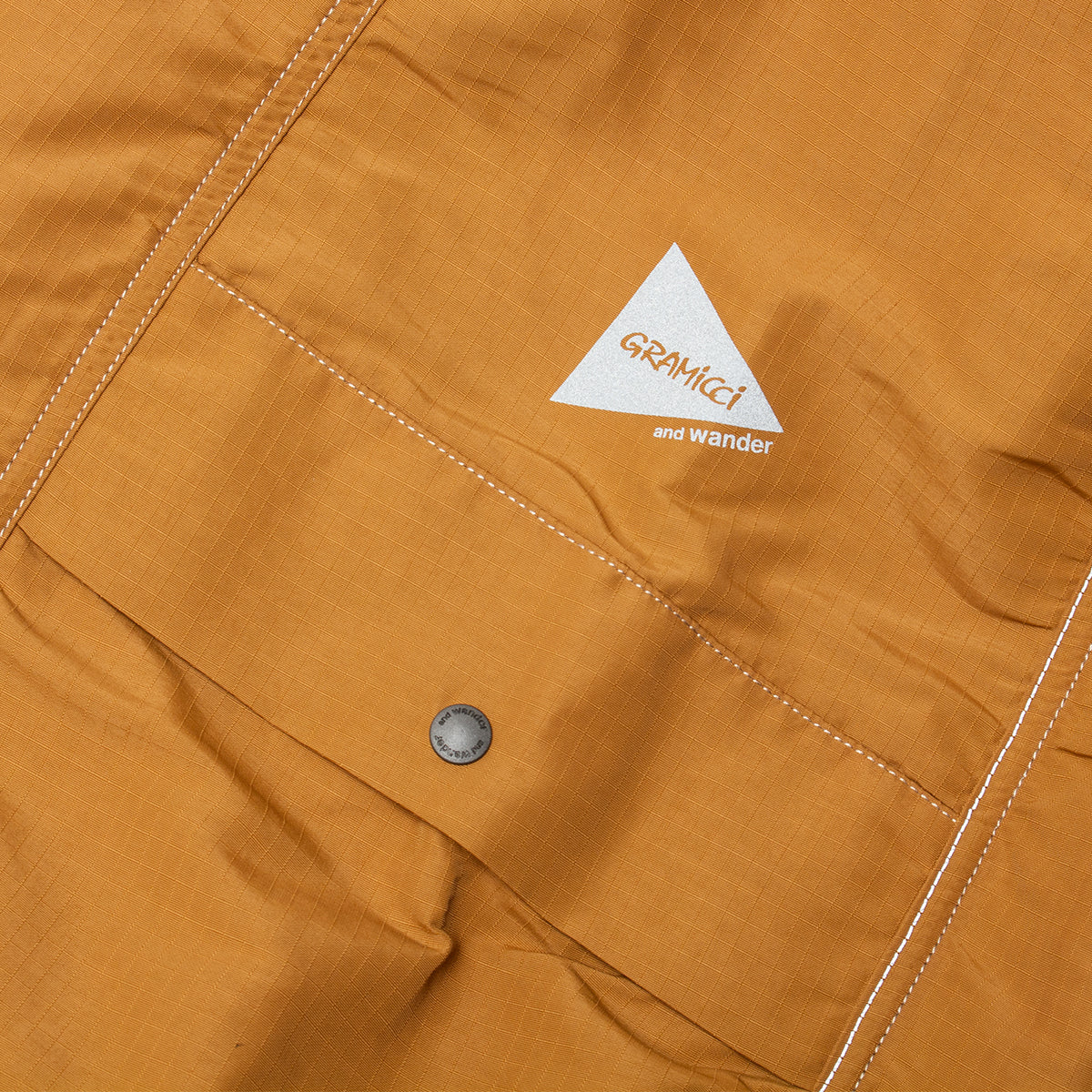 Gramicci x And Wander Women's Ripstop Voyager Pants
Color : Orange