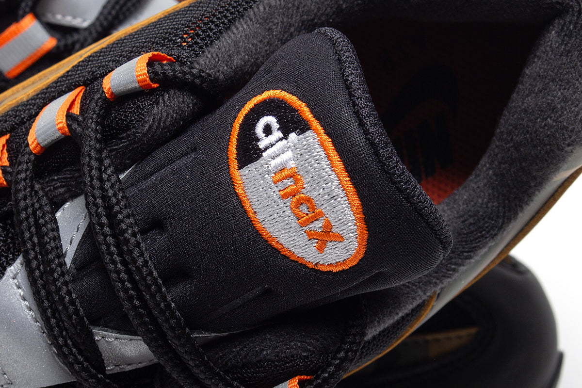 Nike - Air Max 95
Style # HQ1973-001
Color : Black / Safety Orange / Metallic Silver