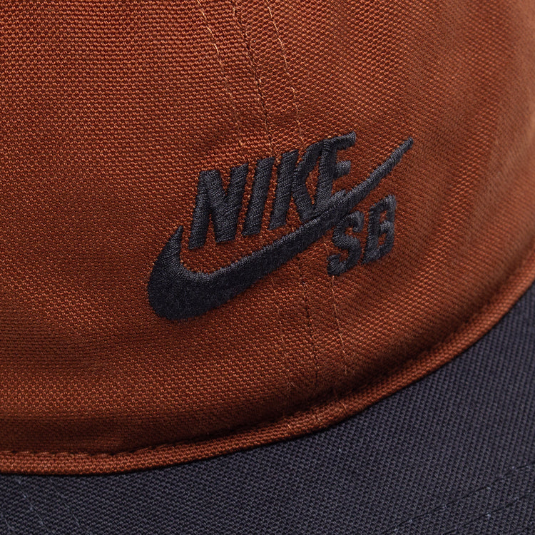 Nike SB - Logo Hat
Style # HF7278-245
Color : Cinnamon / Black