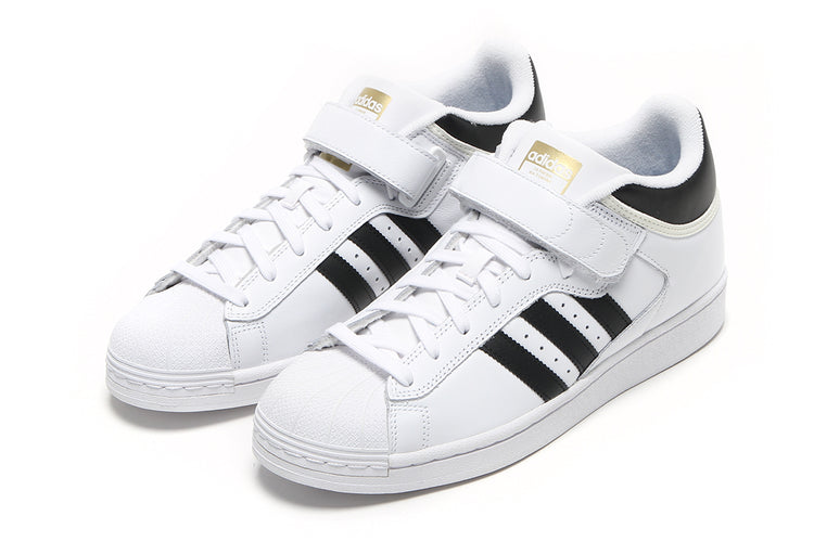 Adidas - Pro Shell ADV
Style # JP8535
Color : Footwear White / Core Black / Gold Metallic