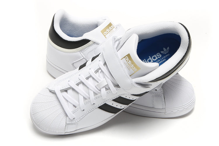 Adidas - Pro Shell ADV
Style # JP8535
Color : Footwear White / Core Black / Gold Metallic