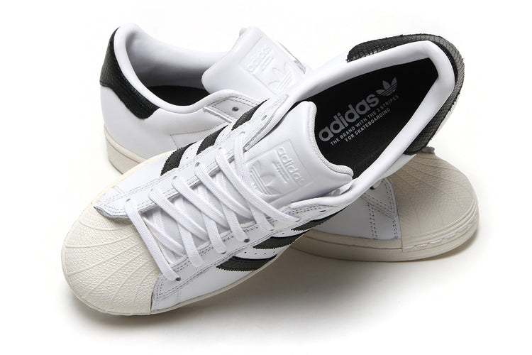 Adidas - Superstar ADV
Style # KI5727
Color : Cloud White / Core Black / Gold Metallic