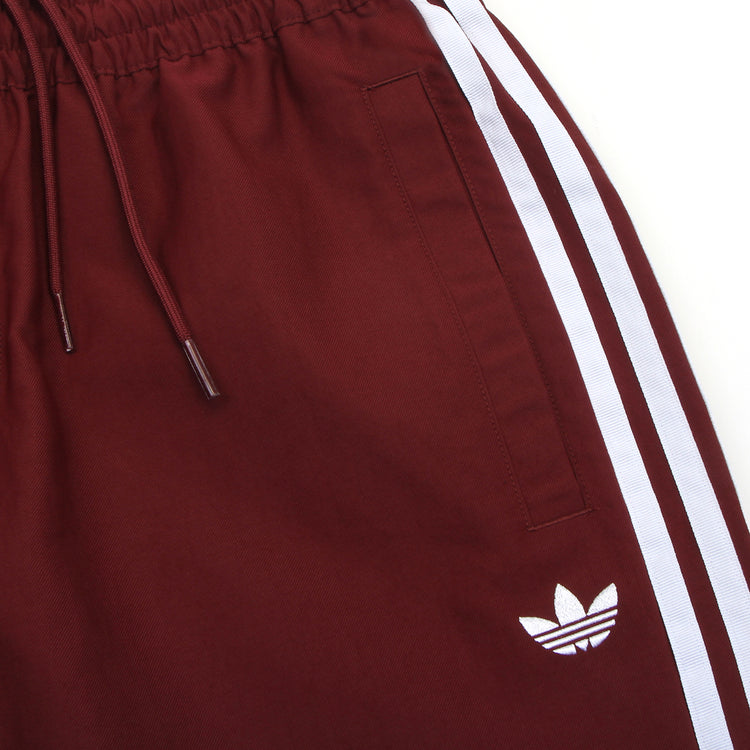 Adidas Skateboarding - Superfire Track Pant
Style # KS4246
Color : Shadow Red / White