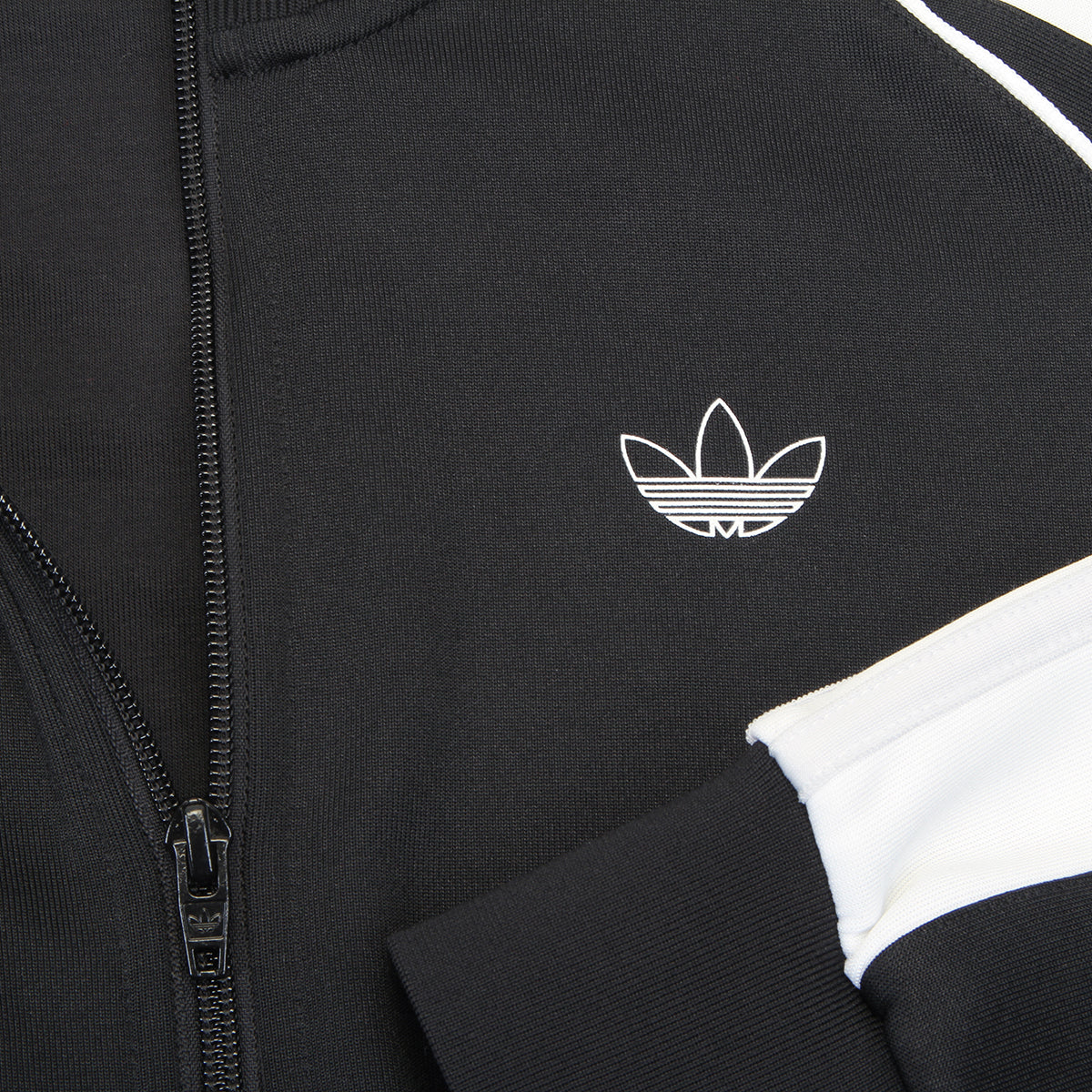 Adidas - Tyshawn Track Jacket
Style # JX5459
Color : Black / White