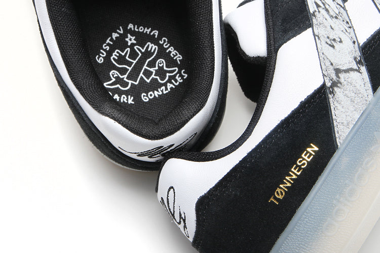 Adidas - Aloha Super x Gustav Tonnesen
Style # JR7101
Color : Core Black / Cloud White / Chalk White