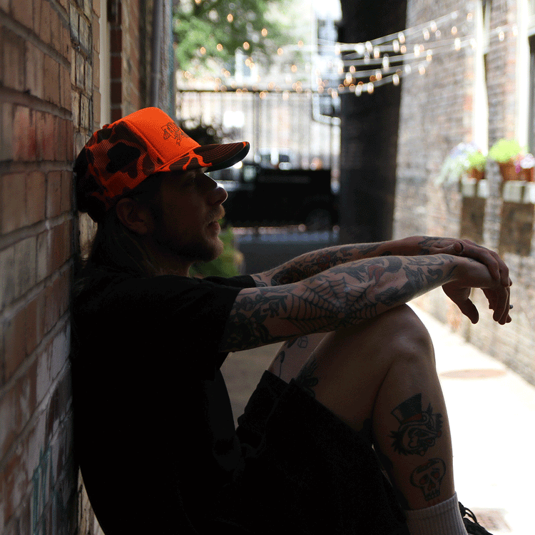 Thrasher x Anti Hero | Mag Banner Trucker Hat Orange Camo