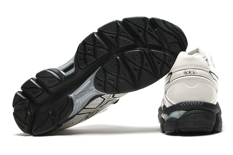 Asics - Gel-Cumulus 16
Style # 1203B071.100
Color : White / Cream / Black