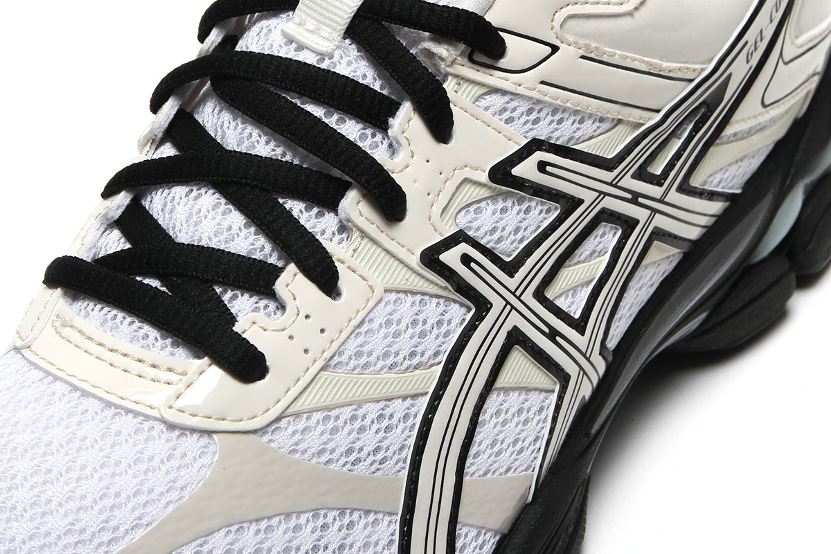 Asics - Gel-Cumulus 16
Style # 1203B071.100
Color : White / Cream / Black