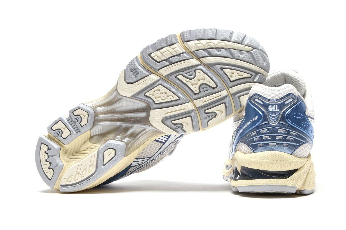 Asics | Gel-Kayano 14
Style # 1203A537.102
Color : Cream / Denim Blue