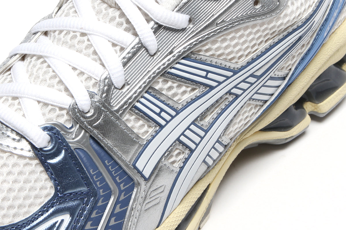 Asics | Gel-Kayano 14
Style # 1203A537.102
Color : Cream / Denim Blue