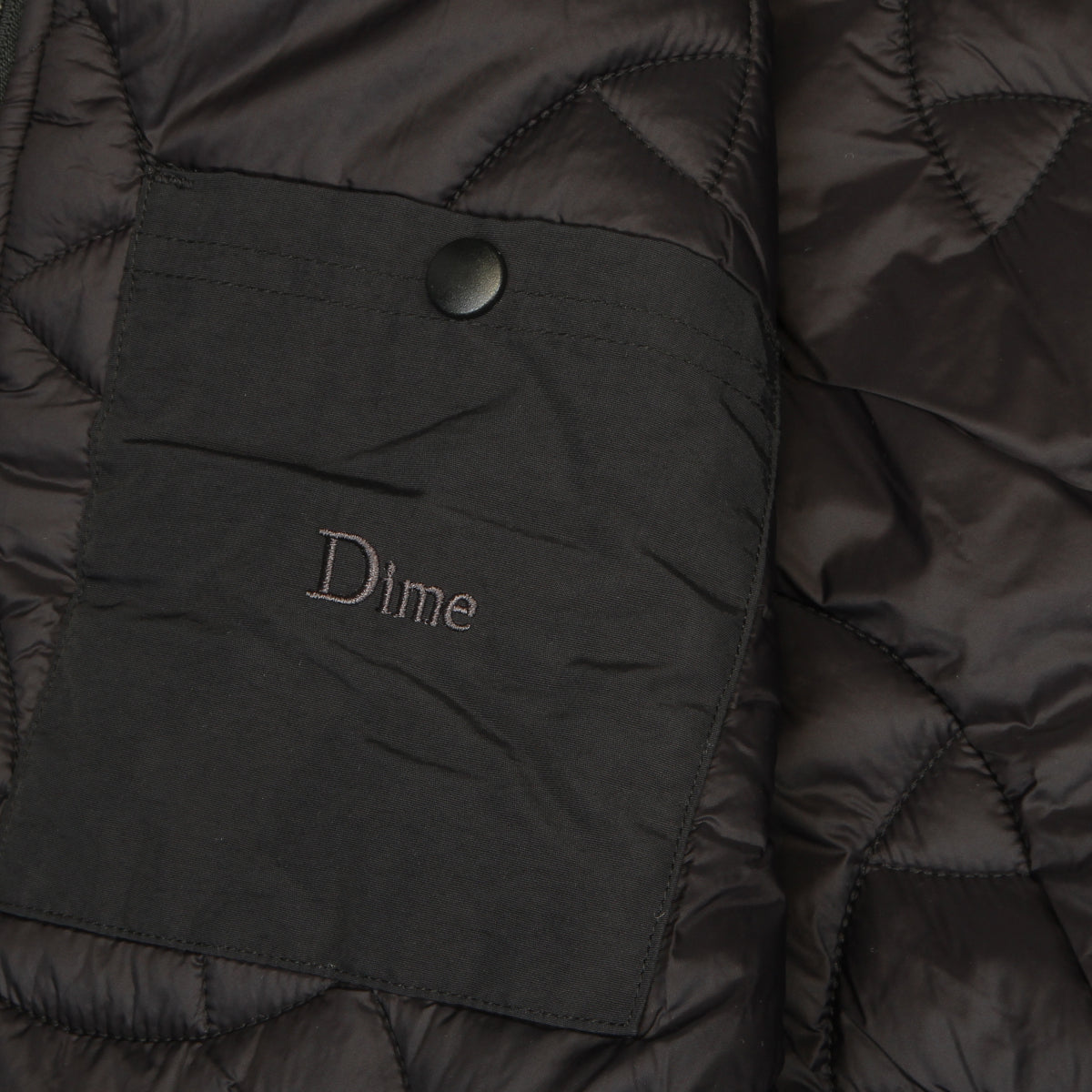 Dime - Reversible Vest
Color : Black