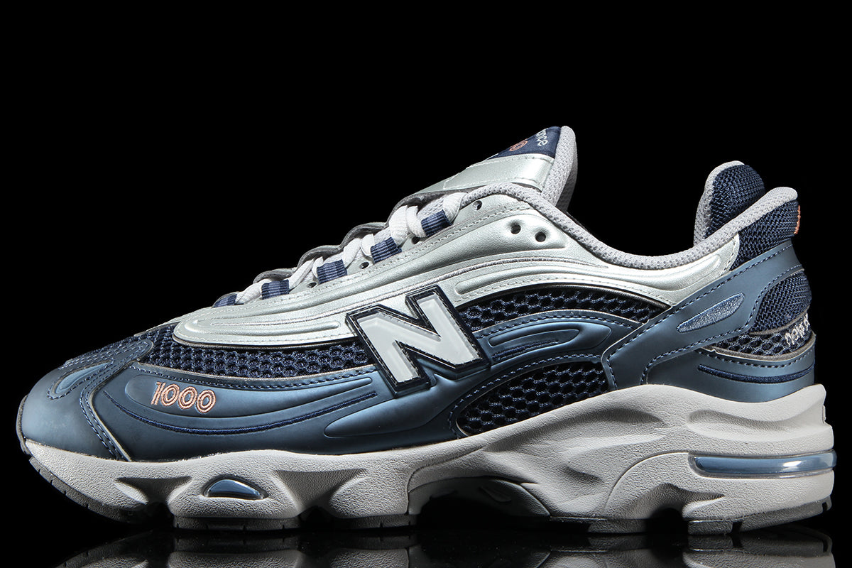 New Balance - 1000
Style # M1000P
Color : Vintage Indigo / Light Silver Metallic / Peach Nectar
