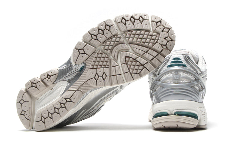 New Balance | 1906R
Style # M1906REE
Color : Metallic Silver / Sea Salt / New Spruce